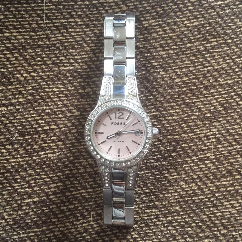 Fossil watch with light pink face